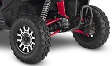 Mounted on cast aluminum wheels the aggressive Maxxis tires—28 x 9-15 front; 28 x 11-15 rear—grab hard on any surface. They were tuned by Honda and Maxxis experts to optimize comfort and handling performance.