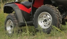 Radial tires provide a smooth ride and exceptional handling. Tough, large-diameter 25 x 8 - 12 front tires and 25 x 10 - 12 rear tires provide added ground clearance. Attractive large-diameter 12-inch aluminum wheels further reduce unsprung weight and contribute to superb handling.