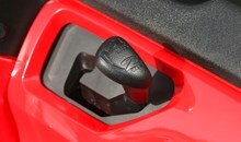 Handy 4WD/2WD selector lever, mounted on the left-front panel, allows you to engage 4WD when needed for the tough stuff and 2WD when conditions allow.